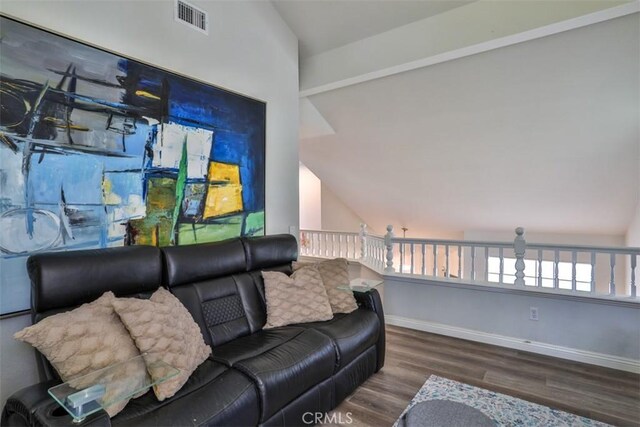 1398 Carissa St, Upland, CA 91784 - living area with wood finished floors, lofted ceiling, and baseboards