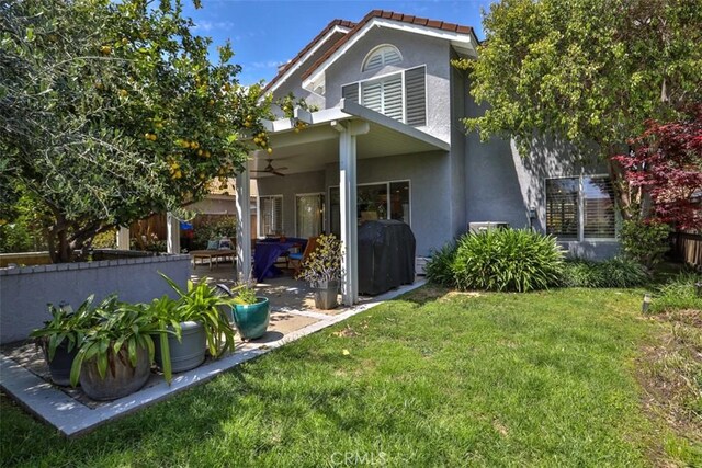 1398 Carissa St, Upland, CA 91784 - rear view of property with a ceiling fan, stucco siding, and a patio