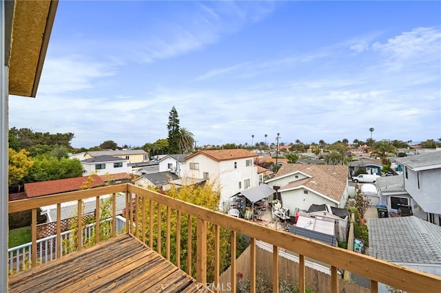 wooden deck featuring a residential view