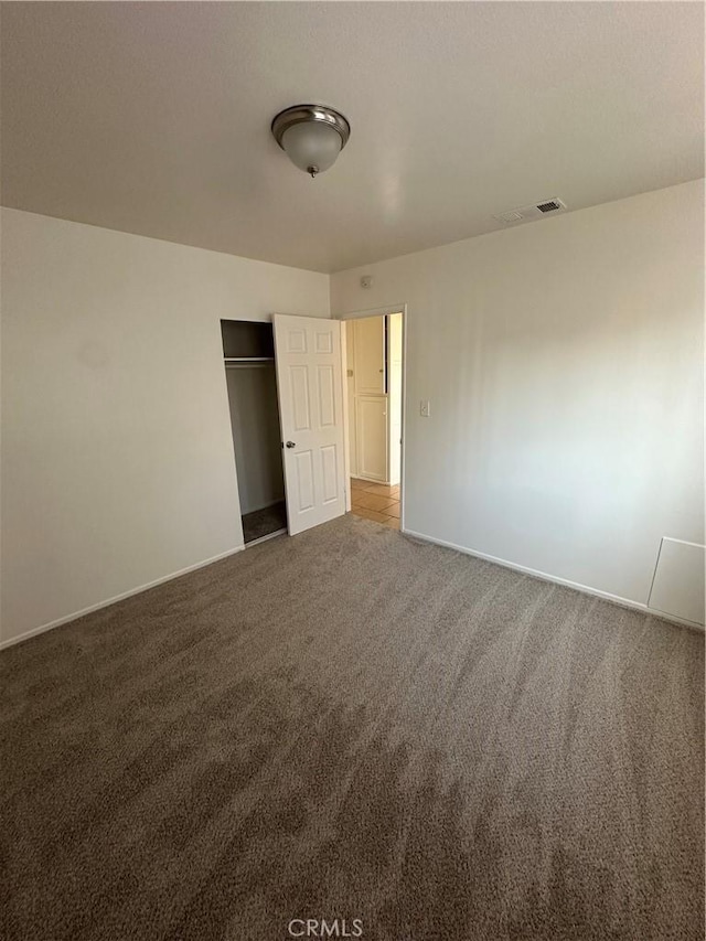 44226 2nd St E, Lancaster, CA 93535 - unfurnished bedroom with carpet floors, baseboards, and a closet
