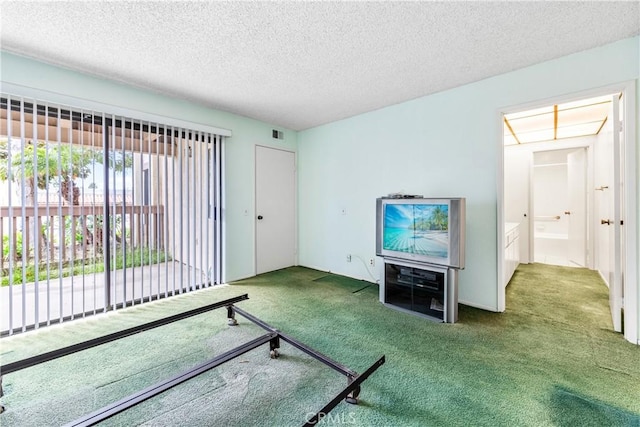16512 Blackbeard Ln Unit 102, Huntington Beach, CA 92649 - unfurnished bedroom featuring carpet and a textured ceiling