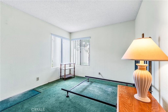 16512 Blackbeard Ln Unit 102, Huntington Beach, CA 92649 - carpeted spare room with a textured ceiling and baseboards