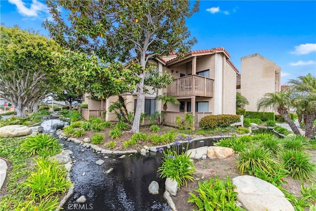 16512 Blackbeard Ln Unit 102, Huntington Beach, CA 92649 - view of community featuring a small pond