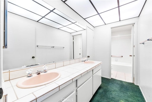 16512 Blackbeard Ln Unit 102, Huntington Beach, CA 92649 - bathroom featuring toilet, double vanity, shower / tub combination, and tile patterned floors