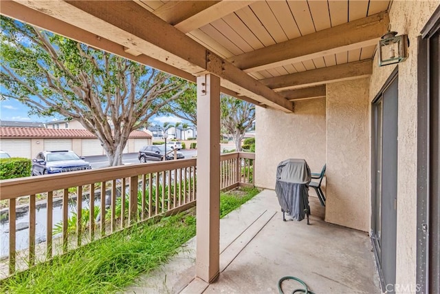 16512 Blackbeard Ln Unit 102, Huntington Beach, CA 92649 - view of patio featuring a residential view and covered porch
