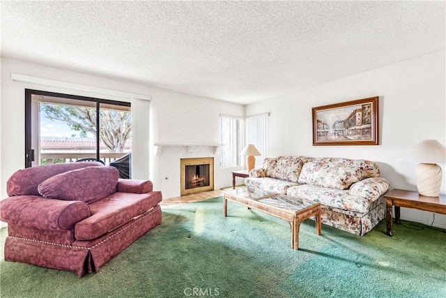 16512 Blackbeard Ln Unit 102, Huntington Beach, CA 92649 - living room featuring carpet, a textured ceiling, and a high end fireplace