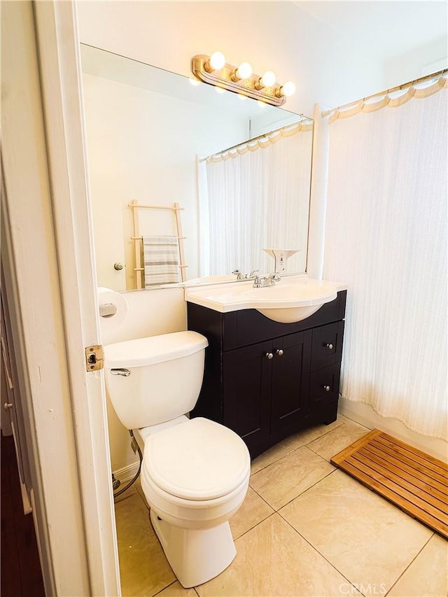 18711 Cerise Ave, Torrance, CA 90504 - full bath featuring toilet, tile patterned floors, vanity, and curtained shower