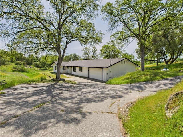 43642 Crystal Cave Cir, Coarsegold, CA 93614 - view of front of property with an attached garage and driveway