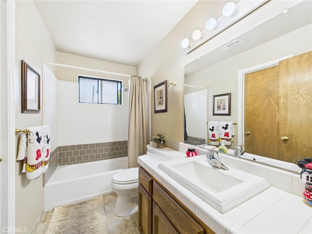 40170 Hillsborough Loop, Oakhurst, CA 93644 - full bath with toilet, vanity, shower / bath combo with shower curtain, and tile patterned flooring