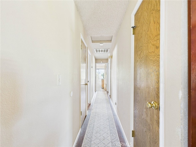 40170 Hillsborough Loop, Oakhurst, CA 93644 - hall featuring baseboards and tile patterned floors