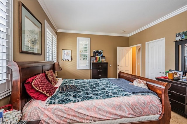 bedroom with ornamental molding