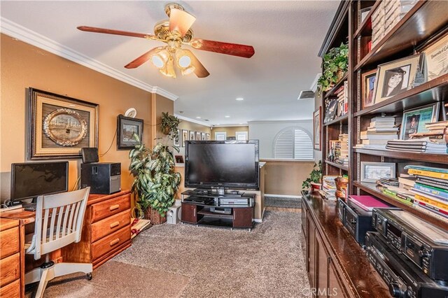 carpeted office space with crown molding, a ceiling fan, baseboards, and recessed lighting