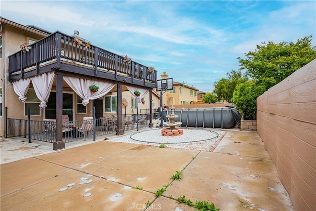 view of patio / terrace with fence