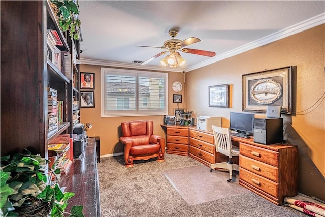 office space featuring ornamental molding, carpet, and a ceiling fan