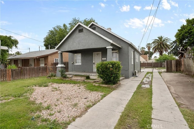 view of front of home featuring covered porch and stucco siding