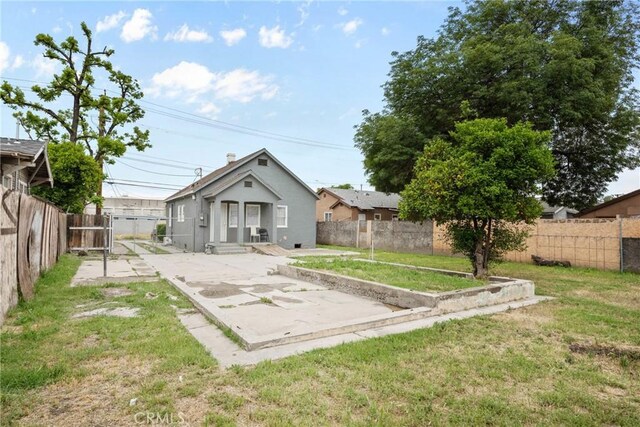 back of property featuring a patio area