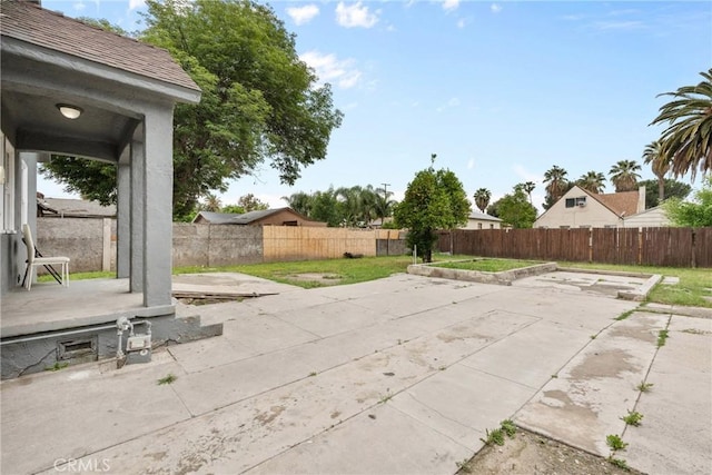 view of patio with a fenced backyard
