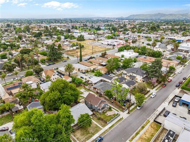 aerial perspective of suburban area with mountains