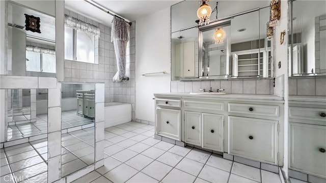 2001 Kenilworth Ave, Los Angeles, CA 90039 - bathroom with tile patterned flooring, vanity, and a tub to relax in