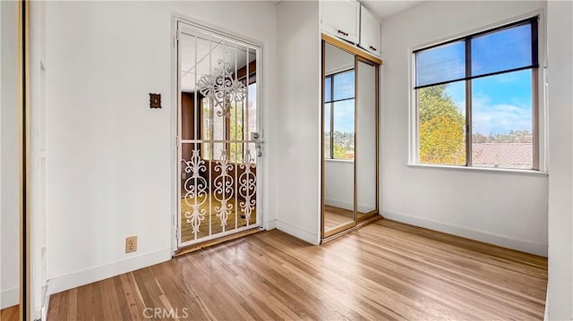 2001 Kenilworth Ave, Los Angeles, CA 90039 - entryway featuring light wood-style flooring, plenty of natural light, and baseboards