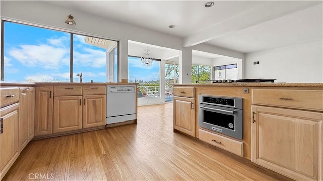 2001 Kenilworth Ave, Los Angeles, CA 90039 - kitchen featuring dishwasher, light brown cabinetry, stainless steel oven, beamed ceiling, and recessed lighting
