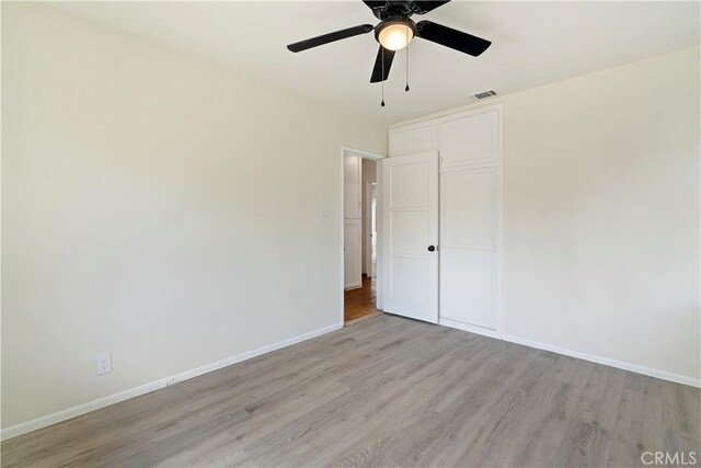 6255 Satsuma Ave, North Hollywood, CA 91606 - unfurnished bedroom featuring light wood-style floors, baseboards, a closet, and a ceiling fan