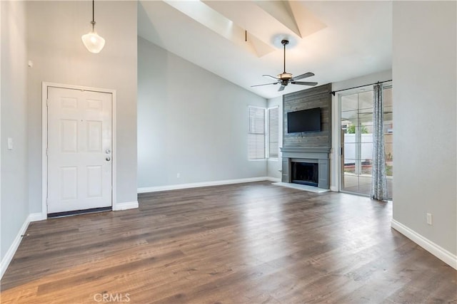unfurnished living room featuring ceiling fan, high vaulted ceiling, baseboards, dark wood-style floors, and a fireplace