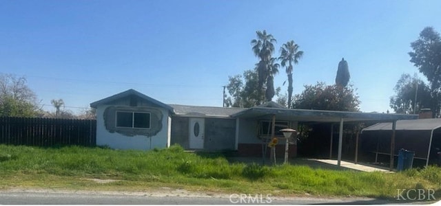 1255 Fitzgerald, Hanford, CA 93230 - single story home featuring fence and a carport