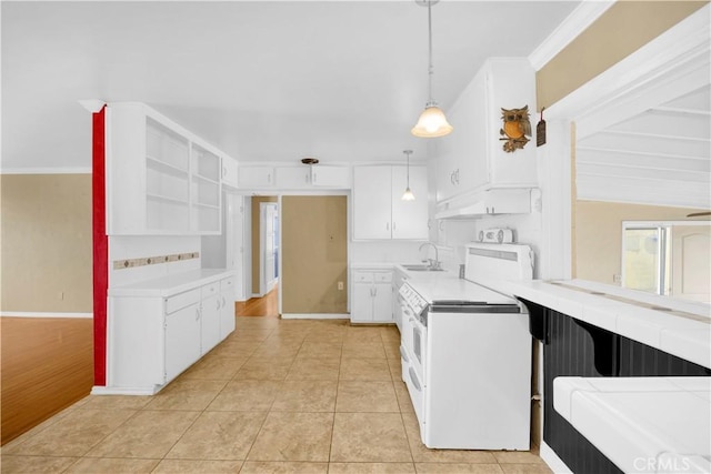 4662 Howard Ave, Los Alamitos, CA 90720 - kitchen featuring a sink, white cabinetry, white range oven, light tile patterned flooring, and open shelves