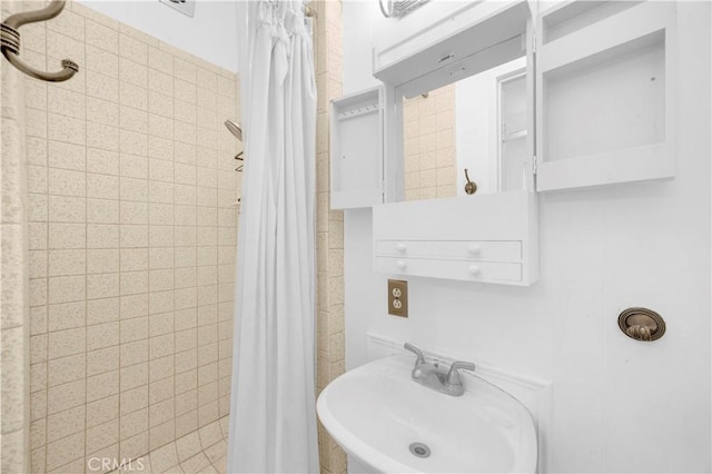 4662 Howard Ave, Los Alamitos, CA 90720 - bathroom with a sink and a stall shower