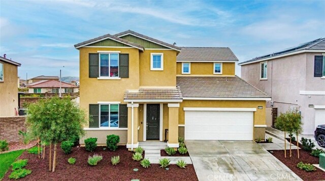 29145 Dune Primrose, Lake Elsinore, CA 92530 - view of front of home featuring concrete driveway and stucco siding