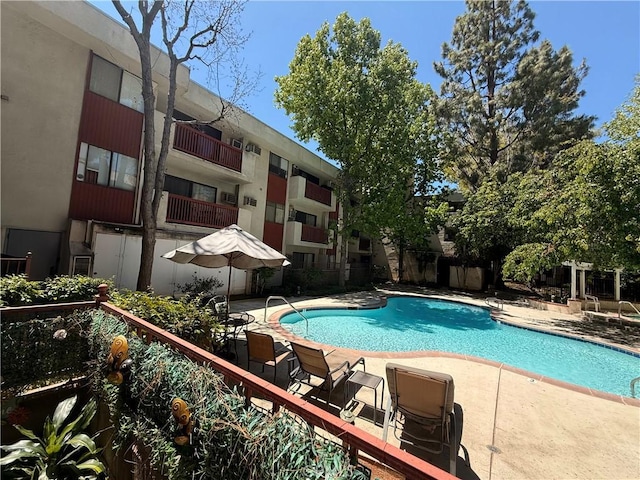 20234 Cantara St Unit 143, Winnetka, CA 91306 - community pool featuring a patio area
