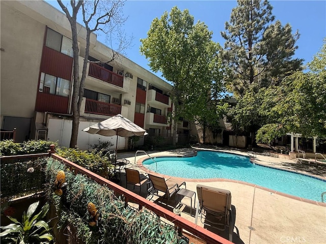 20234 Cantara St Unit 143, Winnetka, CA 91306 - community pool featuring a patio area