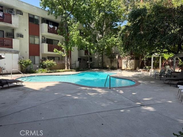 20234 Cantara St Unit 143, Winnetka, CA 91306 - community pool featuring a patio area