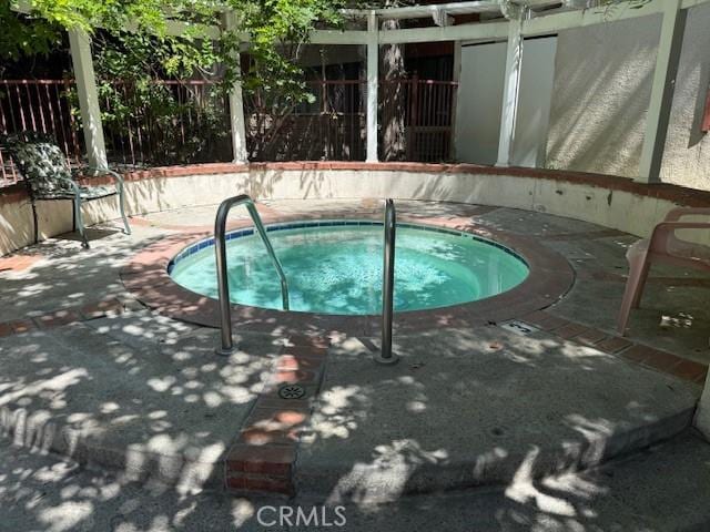 20234 Cantara St Unit 143, Winnetka, CA 91306 - view of swimming pool with a community hot tub and a swimming pool