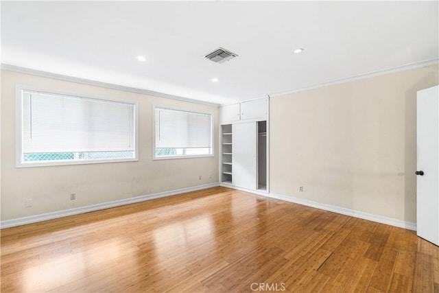 1731 E Wardlow Rd, Long Beach, CA 90807 - unfurnished bedroom with baseboards, light wood finished floors, recessed lighting, and ornamental molding