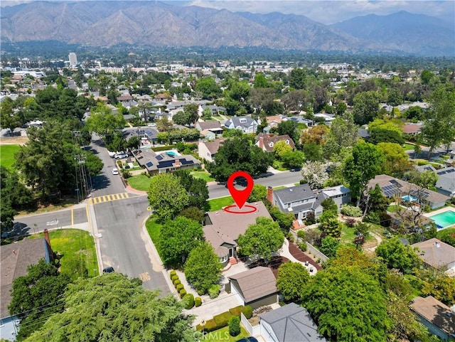 aerial perspective of suburban area with a mountain backdrop