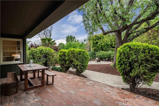 view of patio with outdoor dining area