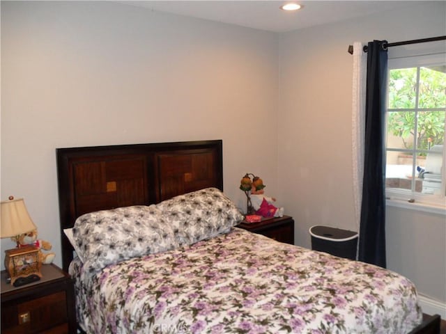 bedroom featuring recessed lighting
