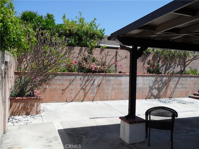 view of patio / terrace featuring a fenced backyard