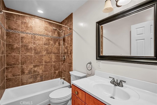 full bath featuring bathtub / shower combination, vanity, and toilet