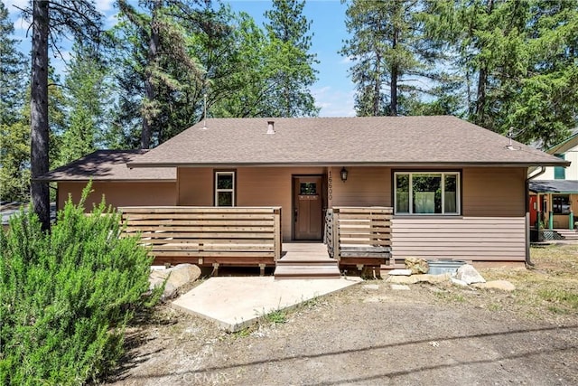 16600 Mountain View Dr, Cobb, CA 95426 - view of front facade with a shingled roof and a wooden deck