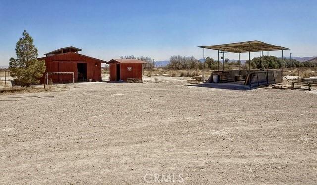 36072 Meadow Grove Rd, Yermo, CA 92398 - view of yard with an outbuilding and a detached carport