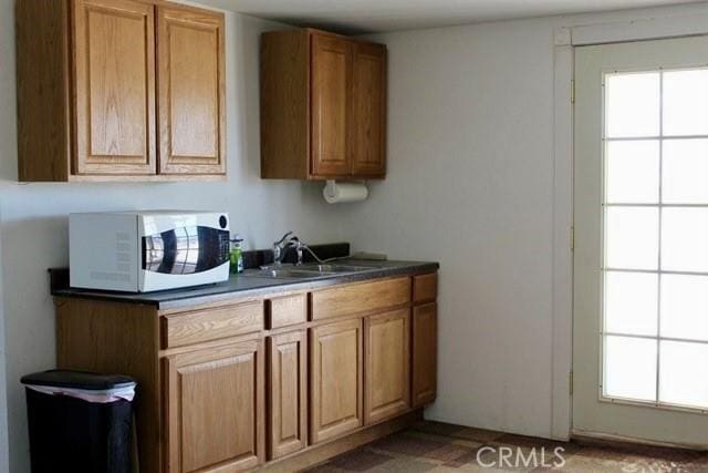 36072 Meadow Grove Rd, Yermo, CA 92398 - bar area featuring white microwave, a sink, and plenty of natural light