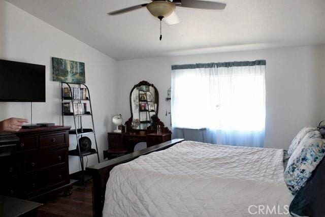 36072 Meadow Grove Rd, Yermo, CA 92398 - bedroom featuring wood finished floors, lofted ceiling, and ceiling fan