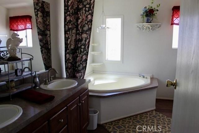 36072 Meadow Grove Rd, Yermo, CA 92398 - bathroom with a garden tub and double vanity
