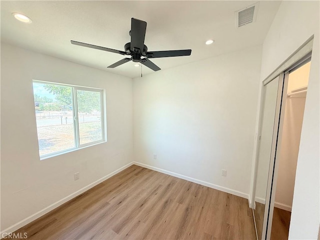 11921 4th Ave, Hesperia, CA 92345 - unfurnished bedroom featuring light wood-style floors, recessed lighting, baseboards, a closet, and a ceiling fan