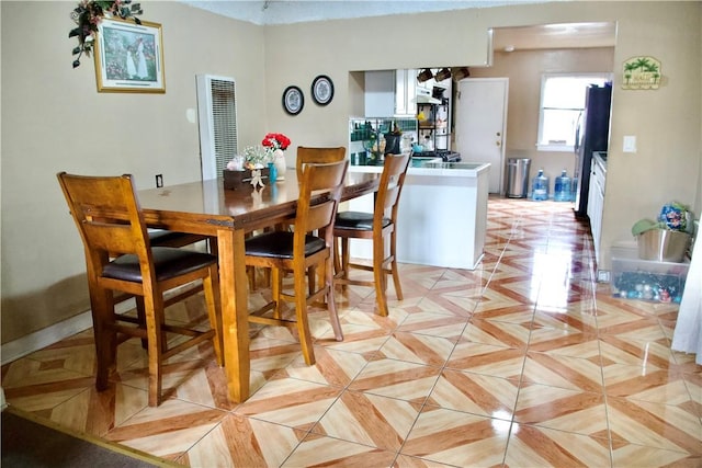 837 W 103rd St, Los Angeles, CA 90044 - dining space with a heating unit