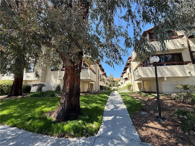 18122 Sundowner Way Unit 1108, Canyon Country, CA 91387 - surrounding community featuring a residential view and a yard