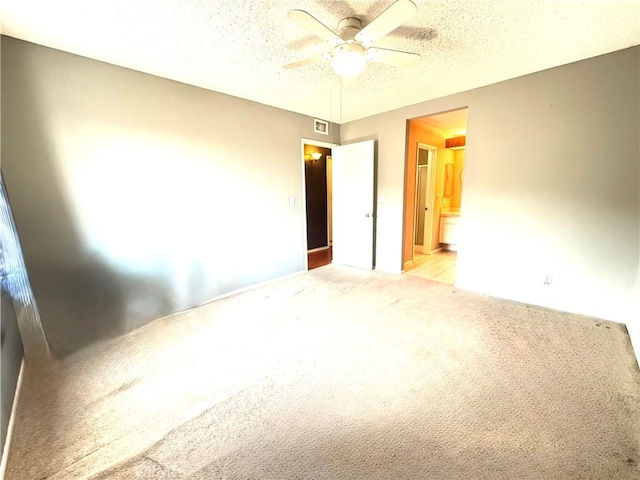 18122 Sundowner Way Unit 1108, Canyon Country, CA 91387 - spare room featuring a ceiling fan, carpet flooring, and a textured ceiling